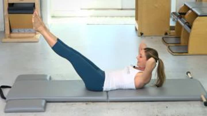 How to do the Double Straight Leg Stretch